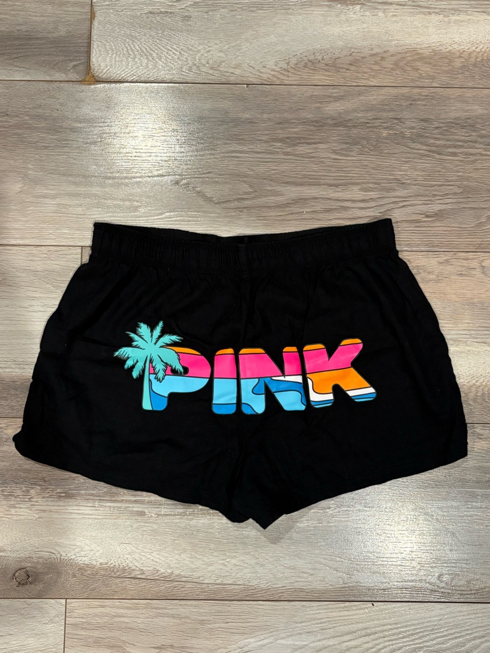 Victoria's Secret Black Athletic Shorts with Pink and Blue Tropical Logo
